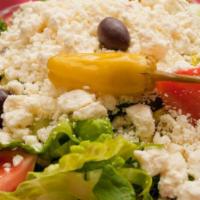 Greek Salad · Romaine lettuce, Roma tomatoes, red onions, cucumbers, green peppers, feta cheese, Greek kal...
