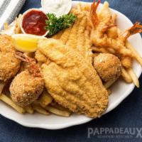 Seafood Platter · Includes 1 fish, 2 crab cakes and 5 jumbo shrimp. Comes with french fries and house salad.