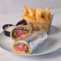 Falafel Sandwich · Patty-shaped fritter made with chickpeas, fava beans, garlic, onions, parsley, and served in...