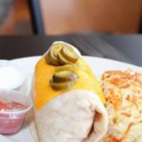 Breakfast Burrito Special · Scrambled eggs, tomato, onion, and chorizo in a flour tortilla, topped with cheddar cheese a...