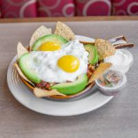 Ole Skillet · Pork chorizo,jalapenos, cheddar cheese, avocado served with sour cream and pico de gallo
And...