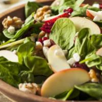 Apple Spinach Salad · Sliced apple chips, mixed greens, red onion, pecans, raisins, and blue cheese. Add protein f...