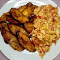 Plantain & Egg · Golden fried plantains served with eggs scrambled in Chef's Signature Sauce.