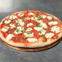 Margherita Pizza · Crushed tomato, fresh mozzarella, and fresh basil.