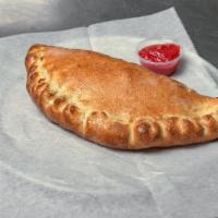 Calzone · Baked golden brown, with our fresh dough, stuffed with grande mozzarella, provolone, and ric...