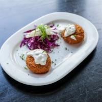 Max's Famous Crab Cakes · Mustard caper aioli, red cabbage, and jicama slaw.
