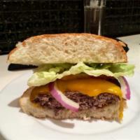 Hamburger Max · 100% Angus Beef, Butter lettuce, tomato, and red onion. Comes with choice of side.
