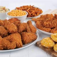 Chicken Mix Family Meal · 12 pieces chicken mix, 6 pieces Cajun tenders, 6 biscuits & family fries.