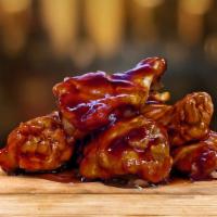 Honey BBQ Wings · Wings tossed with BBQ sauce served with your choice of blue cheese or ranch.
