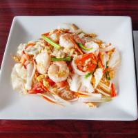 Pad Woon Sen · Glass noodles stir fried with tomatoes, onions, cabbage, bean sprouts, eggs, and mushrooms.