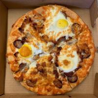 Wake and Bake Pizza · Bacon, sausage and eggs over easy.