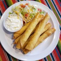 Flauta a la Carte · Corn tortilla rolled with meat inside and deep-fried.
