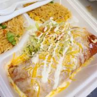 Chimichanga · Choice of ground beef, shredded chicken or pork in sauce served with rice and beans, lettuce...