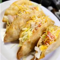 Flour Deep Fried Tacos Plate · 3 flour deep-fried tacos with choice of shredded chicken or ground beef, lettuce, tomatoes &...