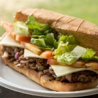 Cheesesteak Sub · Rib-eye steak, onions, green peppers, mushrooms, mayo, provolone cheese, lettuce, and tomato...