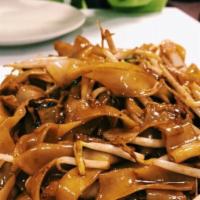 Beef Chow Foon · Wok tossed.