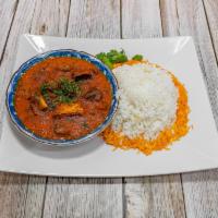 Goat Curry · Goat meat sauteed in India’s favorite yellow curry sauce cooked with grilled onions, turmeri...