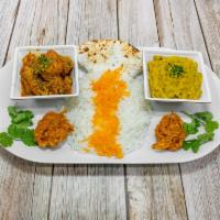 Chicken Meat Platter · Comes with rice, chappati, daal, chicken curry, pakora and rice pudding or gulab jamun.
