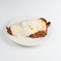 Milanesa napolitana  · breaded steak or chicken whit tomato sauce, cheese and ham