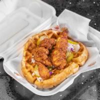 Waffle Bomb Sandwich · Quarter a pound of handcrafted chicken tenders, Coleslaw, pickles & maple sauce on a fresh h...