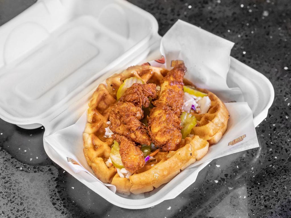 Waffle Bomb Sandwich · Quarter a pound of handcrafted chicken tenders, Coleslaw, pickles & maple sauce on a fresh homemade waffle.