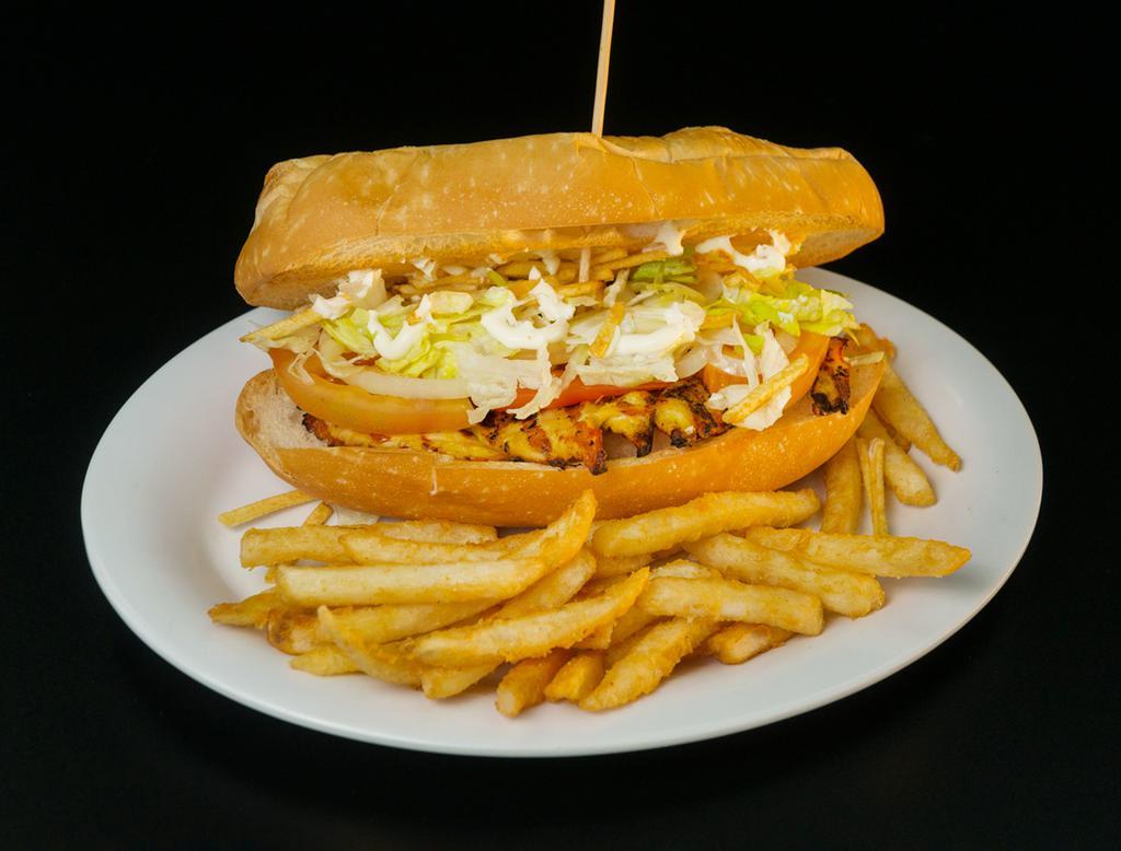 Sandwich de pollo · Chicken, caramelized onion, shoestring potatoes, lettuce, tomato and mayo. Toasted, pressed and served with all natural fries.