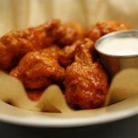Chicken Wings · Served with choice of sauce and ranch or blue cheese dressing.