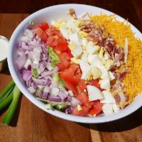 Cobb Salad · Shredded lettuce, tomato, red onion, applewood smoke bacon, blue cheese, cheddar cheese, and...