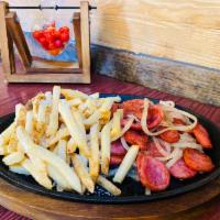 Calabresa Acebolada com Fritas · Brazilian sausage topped with browned sauteed onion, and fries.