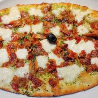 Pesto Bacon Flatbread · Flatbread pizza topped with basil pesto, bacon, Pecorino Romano  & fresh mozzarella.  (790 c...
