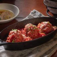 Meatballs · Three freshly prepared hand-crafted meatballs topped with house-made pomodoro. (470 cal)