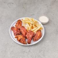 Boneless Wings · Served with french fries, blue cheese or ranch dressing.
