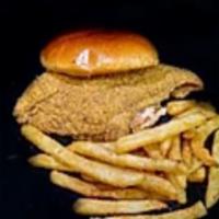 The Cat Daddy Sandwich · Seasoned and breaded catfish topped with house made slaw and comeback sauce. Served on a toa...