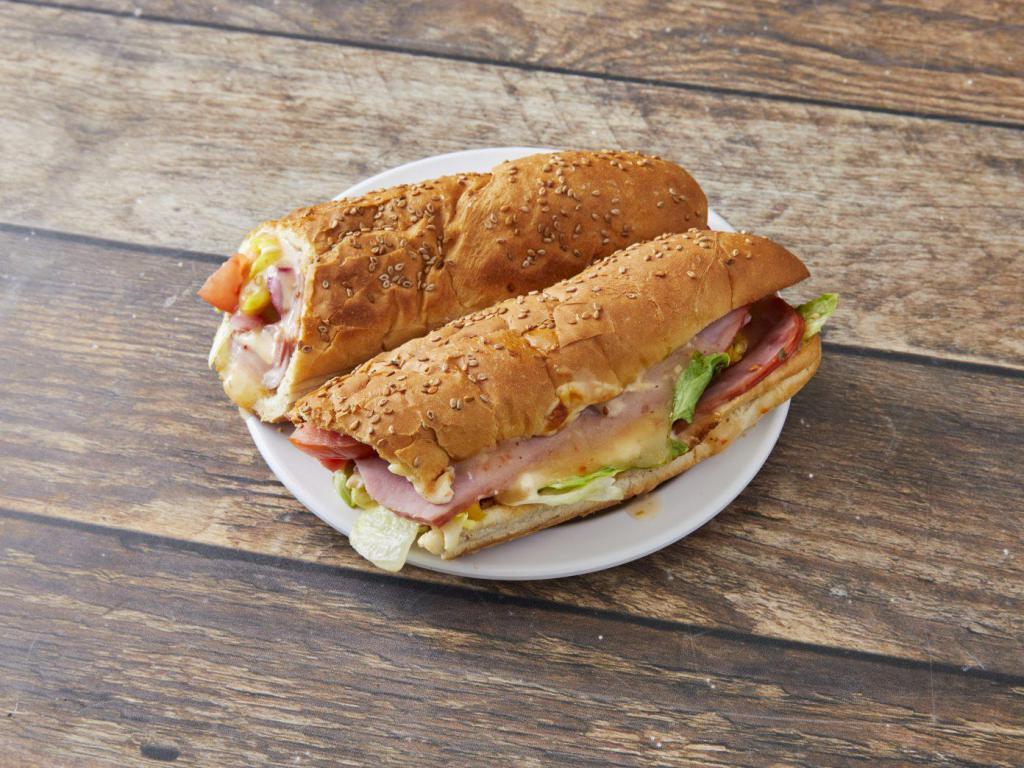 Ham and Cheese  · Ham, cheese, lettuce, tomatoes, onions, mild yellow peppers and Italian dressing.