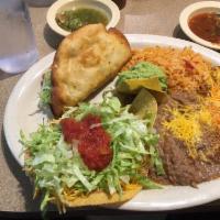 Special Plate · A flour fried beef taco, a cheese enchilada, a bean tostada, rice, beans and guacamole.