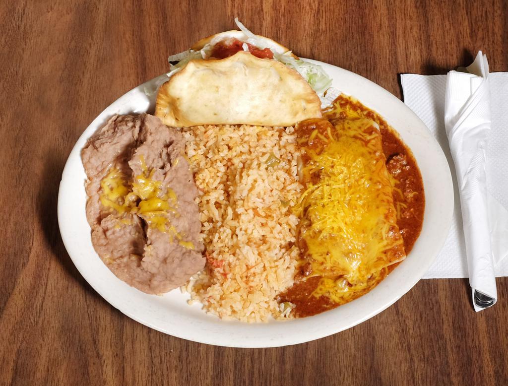 Mexican Plate · 2 cheese enchiladas topped with our homemade beef chili sauce, a flour fried beef taco, rice and beans.