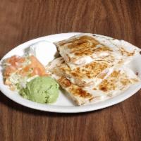 Quesadillas · 2 large flour tortillas, melted mozzarella cheese, served with lettuce, tomatoes, sour cream...