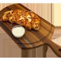 Buffalo Chicken Calzone · Buffalo grilled chicken with mozzarella. Stuffed with pizza cheese