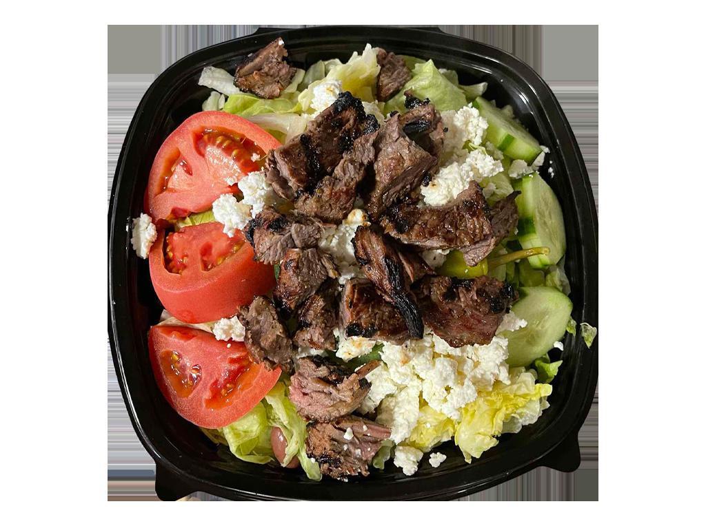Greek salad · Garden salad with Feta cheese. Served with pita bread and choice of dressing