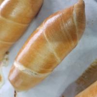Cachitos Ham · Bread rolls filled with ham. the bread of gods. Cachito is where the magic happens. The cach...