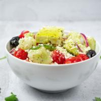 Side Village Salad · Tomatoes, cucumbers, red onions, green peppers, feta cheese, olives, and extra virgin olive ...