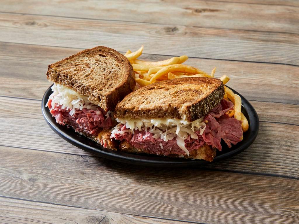 Ruben Sandwich · Served with 1/2 lb. of beef, Swiss cheese, Sour croute and Thousand Island Dressing on Russian marble rye bread.
