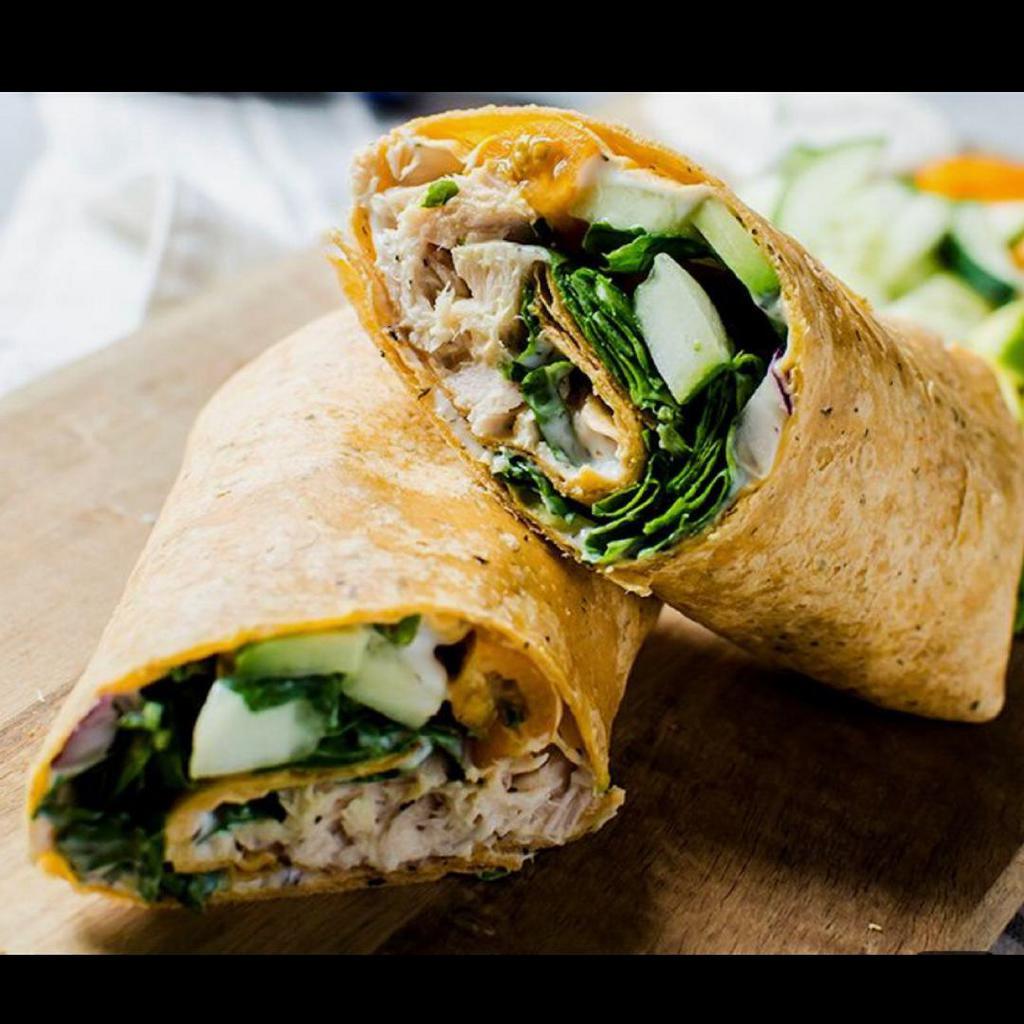 Tuna Sandwich · White bread or whole grain, tuna salad, mozzarella cheese, lettuce, carrot, tomato, red onion, green pepper and olive oil.
