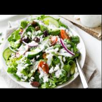 Greek Salad · Mixed greens, cucumbers, red onion, tomato, black olive, feta cheese and Greek dressing.