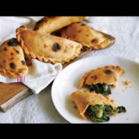 Empanadas · Baked with chicken, beef, spinach and cheese.