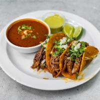 Birria Tacos (3) · 3 tacos on a crispy corn tortilla with cilantro and onions served with a cup of our consome ...