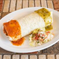 Burrito  · Filled with Mexican rice, refried beans, sour cream cheese, guacamole and pico de gallo.