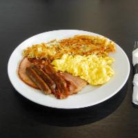 Big League · 3 eggs, 2 bacon, 2 sausages, ham, and choice of hash browns, grits or tomato slices served w...