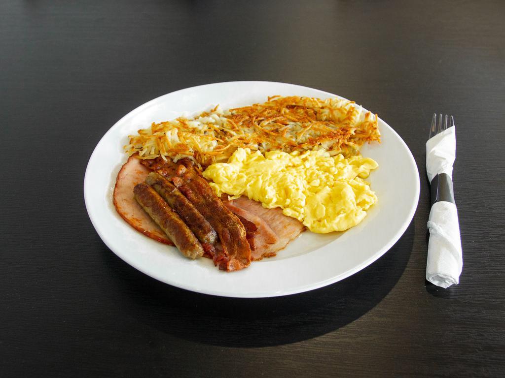 Big League · 3 eggs, 2 bacon, 2 sausages, ham, and choice of hash browns, grits or tomato slices served with toast.