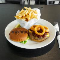 Jams Burger · Topped with bacon jam, cheddar cheese and onion rings, served with lettuce, tomato, and onio...
